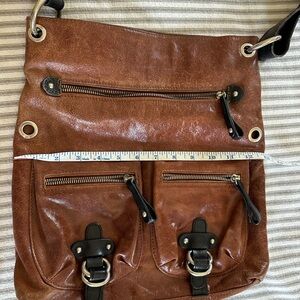 Excellent Tano Brown Leather Shoulder Bag with Black Trim adjustable strap